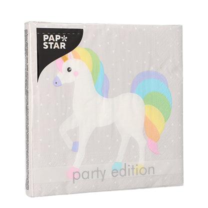 A pack of PAPSTAR GmbH 20 napkins, 33 cm x 33 cm, 3-ply, with a cartoon unicorn and rainbow mane on light gray. The packaging says "PAPSTAR" and "party edition".