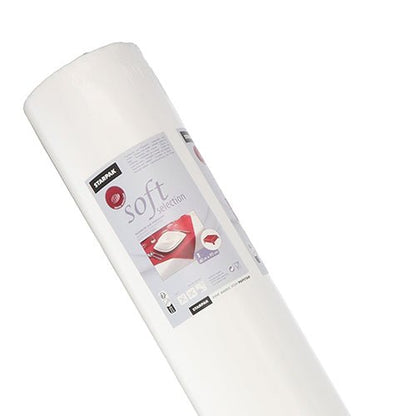 A roll of white Starpak tablecloth, fabric-like, fleece 'Soft Selection' (40 m x 0.9 m) is depicted upright in its box, with product details and an image of a made bed on the packaging against a white background.