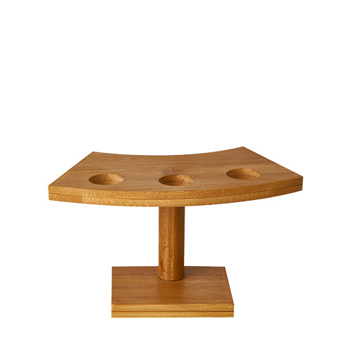 The PAPSTAR holder for 3 cone bags "pure" made of bamboo (9x16 cm) offers three round openings on a rectangular bent stand, ideal for presenting cone bags. Brand: PAPSTAR GmbH, 1 piece.