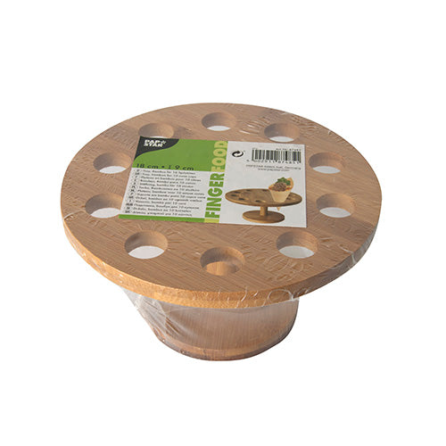 A round bamboo PAPSTAR holder for cone bags (Ø 18 cm) from PAPSTAR GmbH, with ten holes, packaged in plastic and a green-white label on top with ideas for presenting cone bags and detailed product information.