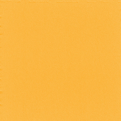 A close-up of a solid yellow-orange textured fabric with subtle diagonal weave, ideal for table decoration or in combination with 30 2-ply napkins "PUNTO" 1/4 fold 38 x 38 cm from PAPSTAR GmbH for striking table decorations.