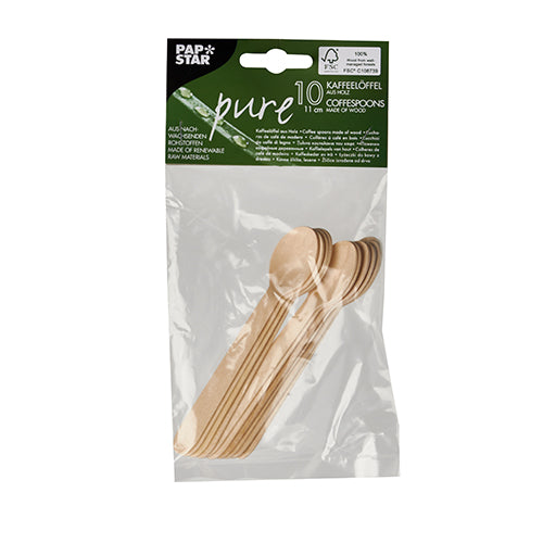 Die transparente Kunststoffverpackung der PAPSTAR GmbH enthält 10 Kaffee- und Dessertlöffel aus Holz der Marke „pure“ (11 cm). Das grüne Etikett mit weißer Schrift zeigt die Marke und Produktinformationen in mehreren Sprachen. Die Löffel sind übersichtlich gestapelt.