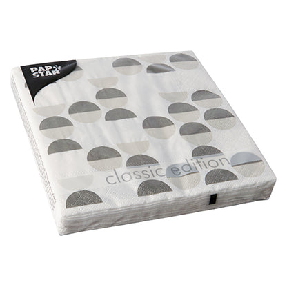 A pack of 20 PAPSTAR napkins, 33 x 33 cm, 3-ply, with a semicircle pattern in gray and black. Comes in a transparent plastic packaging with the inscription "PAP STAR" and "classic edition". Product: Design set 2 from PAPSTAR GmbH.