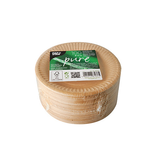 A stack of round, light brown PAPSTAR 100 plates cardboard "pure" from PAPSTAR GmbH. The top cardboard plate shows a green label with product details, barcode, and FSC-certified symbols against a white background.