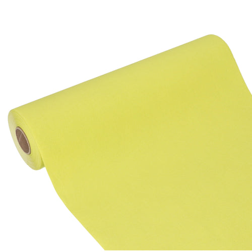 A large roll of PAPSTAR table runner, Tissue "ROYAL Collection" (24m x 40cm) from PAPSTAR GmbH is partially unrolled, showing the smooth tissue surface and the cylindrical cardboard core at one end.