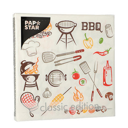 PAPSTAR 20 napkins, 3-ply, 33x33cm, with BBQ motifs such as grill and chef's hat. "PAP STAR" logo in the corner, "classic edition" on the edge. From PAPSTAR GmbH, Design Set 1.