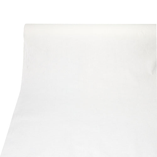 Eine Tischdecke der PAPSTAR GmbH aus der ROYAL Collection (PV-Tissue Mix, 20 m x 1,18 m) liegt ausgerollt auf einer ebenen Fläche, im Vordergrund sind ihre stoffähnliche, glatte Struktur und die geraden Kanten zu erkennen.