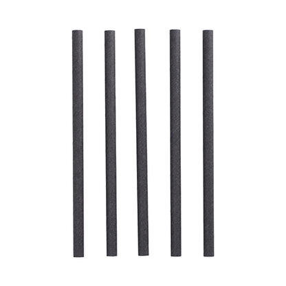 Five black cylindrical PAPSTAR 100 shake straws paper Ø 10 mm · 21 cm from PAPSTAR GmbH stand upright in a row against a white background - ideal for environmentally conscious hosts.