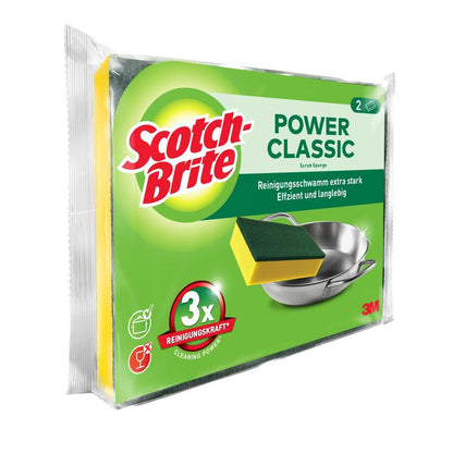 Pictured is a package of 3M Deutschland GmbH Scotch-Brite® Classic Cleaning Sponge with two sponges. On the predominantly green packaging, a sponge and a metal pot are depicted, along with English and German text.