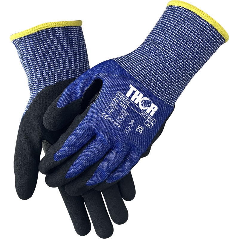 A pair of blue Thor Flex Cut C gloves from Abena Re-Seller GmbH with black palms, yellow-trimmed cuffs, white "THOR" lettering, and safety certificates - ideal for working with cutting tools or cutters.