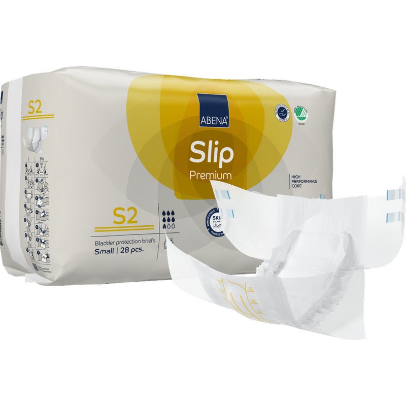 A pack of ABENA Slip Premium from Abena Re-Seller GmbH, size small (28 pieces), with visible branding and an unfolded slip next to the pack.