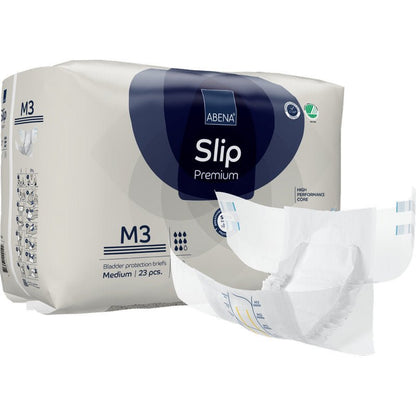 Pictured is a pack of ABENA Slip Premium from Abena Re-Seller GmbH with a medium slip outside the packaging. The pack contains 23 slips for reliable incontinence care.