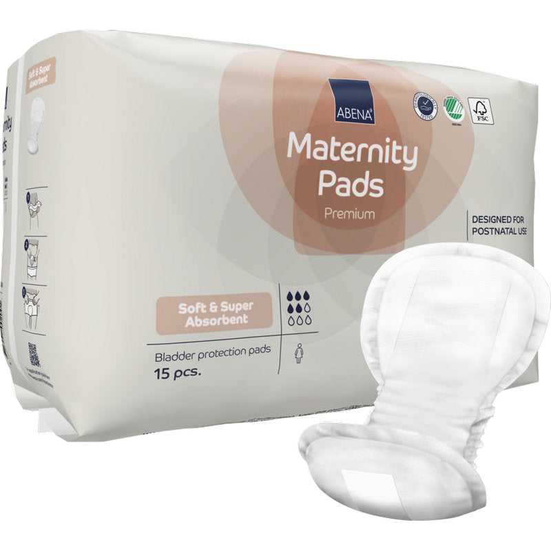 A pack of ABENA Maternity Pad, Premium (15 pieces) from Abena Re-Seller GmbH offers soft, super absorbent pads designed for postpartum use - ideal postpartum pads for maximum comfort after birth, with an open pad pictured at the front.