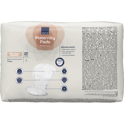 Pictured is a pack of ABENA Maternity Pad, Premium (15 pieces) from Abena Re-Seller GmbH with features of absorbency, skin balance, and leak protection on a multilingual package.