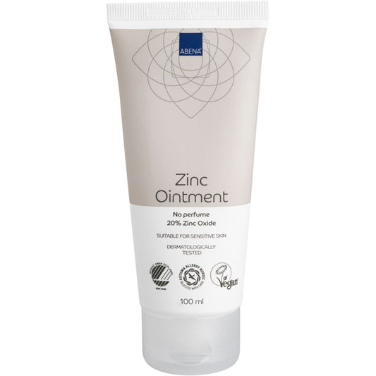 Eine 100 ml Tube Abena Re-Seller GmbH Zinksalbe (20% Zinkoxid), parfümfrei, vegan, dermatologisch getestet und für empfindliche Haut geeignet. Unterstützt die Regeneration. Erhältlich in einer weißen Tube mit beigem Oberteil; Karton enthält 12 Packungen.