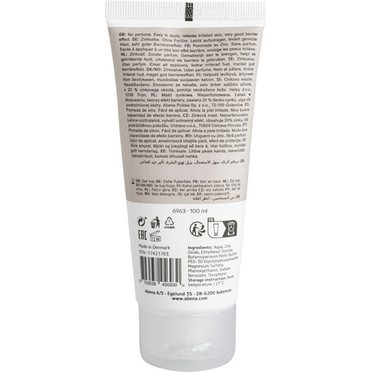 Die weiße Tube der Abena Re-Seller GmbH Zinksalbe, 20% Zinkoxid, 100 ml hat ein braunes Etikett mit mehrsprachiger Gebrauchsanweisung und Inhaltsstoffen sowie Recycling-, EAC- und Zertifizierungslogos für die Hautregeneration. Verkauft in Kartons (12er-Packungen).