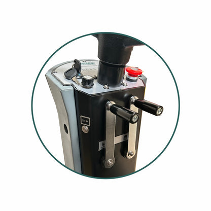 A close-up of the control panel of the Arcora Ro-Man 660Br/90L ride-on scrubber dryer from Arcora International GmbH shows two levers, a black handle, a red emergency stop button, and several buttons - crucial for efficient operation.