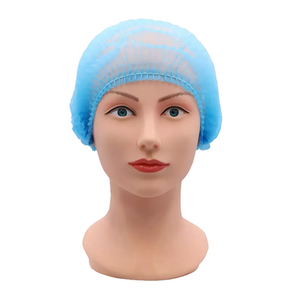 A mannequin head features a blue disposable hair cap, ideal for use in the medical field. It includes painted details with blue eyes and red lips against a plain white background. It is perfectly aligned with the ECO-PLUS clip cap requirements of AMPri Handelsgesellschaft mbH and meets food-safe safety standards.