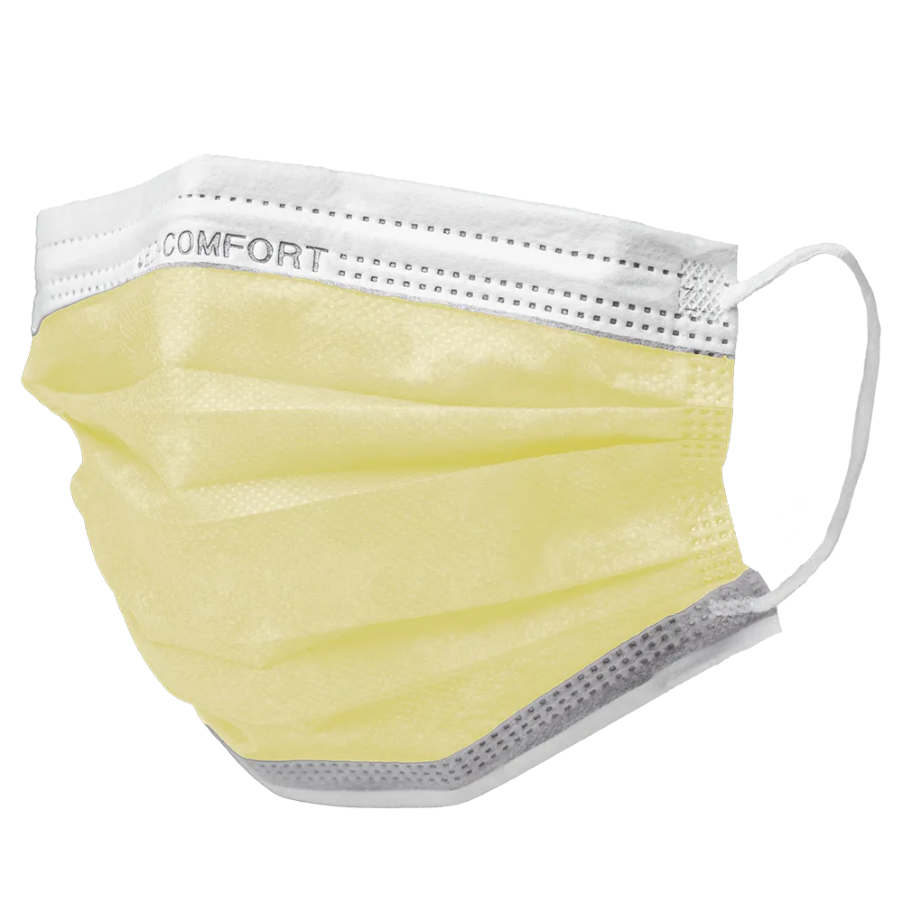 A single AMPri MED-COMFORT surgical mask Type IIR in yellow with ear loops and a white upper edge with the printed word "COMFORT". This disposable face mask, sold by AMPri Handelsgesellschaft mbH, is pleated, lightly textured, and designed as a disposable product for practical use.