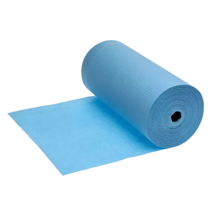 A partially unrolled AMPri patient gown with PE coating on a large blue roll is perfect for dental treatments. Its textured surface enhances its effectiveness and durability, while the PE coating boosts its performance. The roll wraps around a cylindrical core with a hollow center on a plain white background.