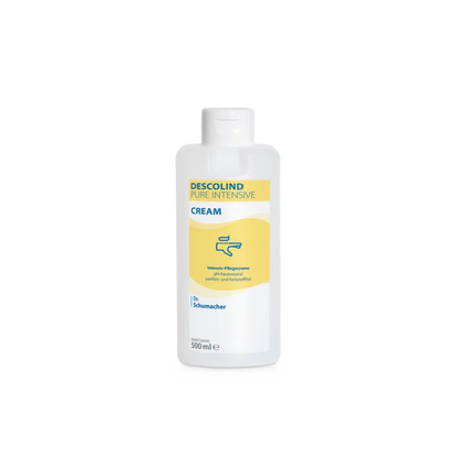 Pictured is a white 500-ml plastic bottle of Dr. Schumacher Descolind Pure Intensive Cream by Dr. Schumacher GmbH, unscented and suitable for sensitive skin, with a yellow-blue label showing a hand symbol, on a plain white background.
