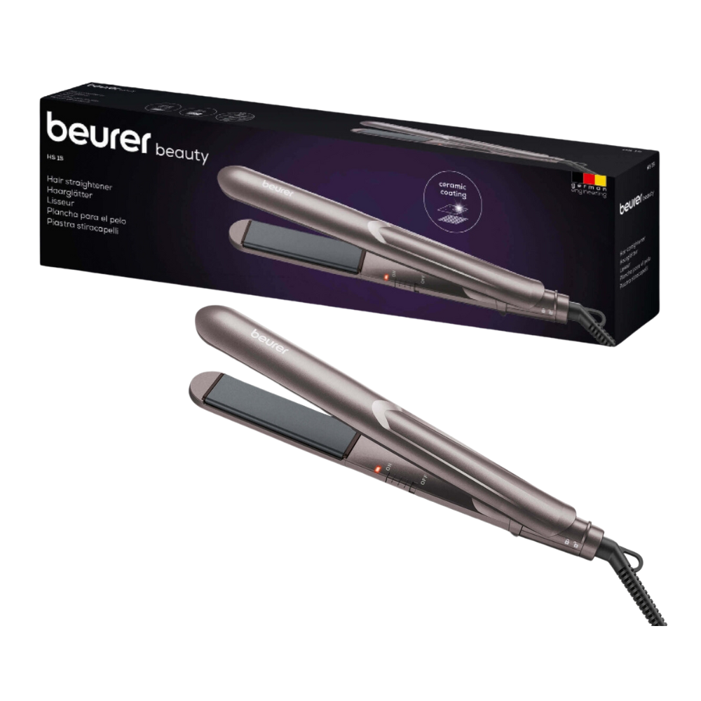 Ein Haarglätter mit der Aufschrift „Beurer HS 15 Haarglätter | Packung (1 Stück)“ von Beurer GmbH wird sowohl in seiner Verpackung als auch ohne Verpackung gezeigt. Der Haarglätter besticht durch ein schlankes, metallisches Design mit Keramik-Beschichtungsplatten. Auf der überwiegend schwarzen Verpackung ist ein Text mit der Hervorhebung von Schnellaufheizung und anderen Produktdetails in mehreren Sprachen zu sehen.