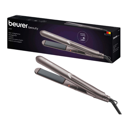 A hair straightener labeled "Beurer HS 15 Hair Straightener | Package (1 piece)" from Beurer GmbH is shown both in its packaging and without packaging. The hair straightener impresses with a sleek, metallic design with ceramic-coated plates. The predominantly black packaging features text highlighting quick heating and other product details in multiple languages.