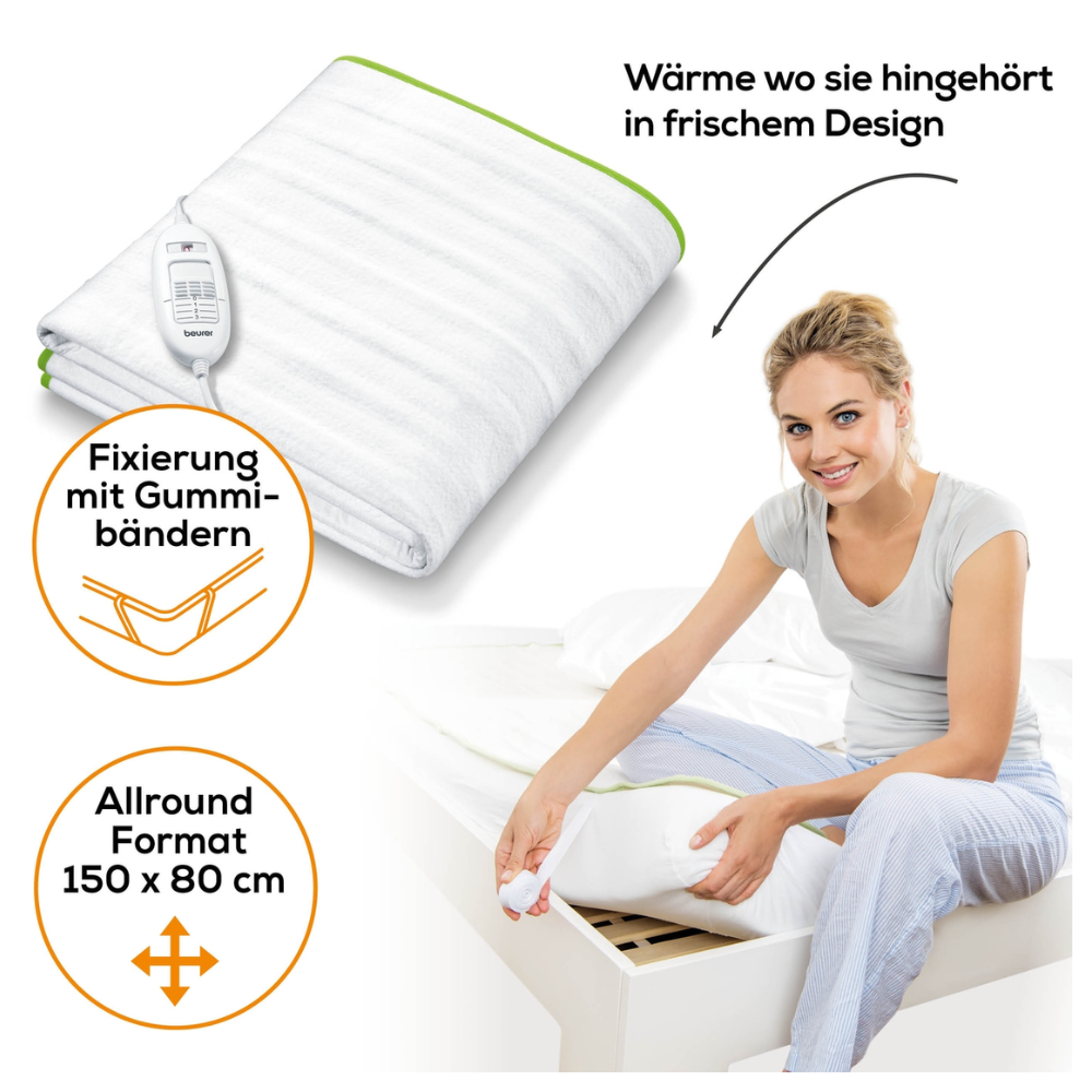 Eine Frau legt ein Beurer Wärmeunterbett TS 15 der Beurer GmbH auf ein Bett. Das Wärmeunterbett hat ein frisches Design und ist 150 x 80 cm groß. Es verfügt über eine Befestigung mit Gummibändern, 3 Temperaturstufen zur Anpassung und ist maschinenwaschbar. Der Text lautet: „Wärme wo sie hingehört in frischem Design.“