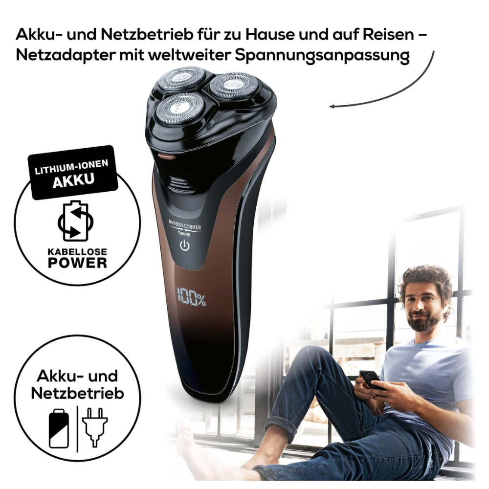 A black electric Beurer HR 8000 rotary shaver from Beurer GmbH with three rotating blades and a digital display showing 100% battery life. The German text highlights battery operation and mains power usage. A man with a beard sits in the background smiling contentedly, which was pointed out by the precision cutting system.