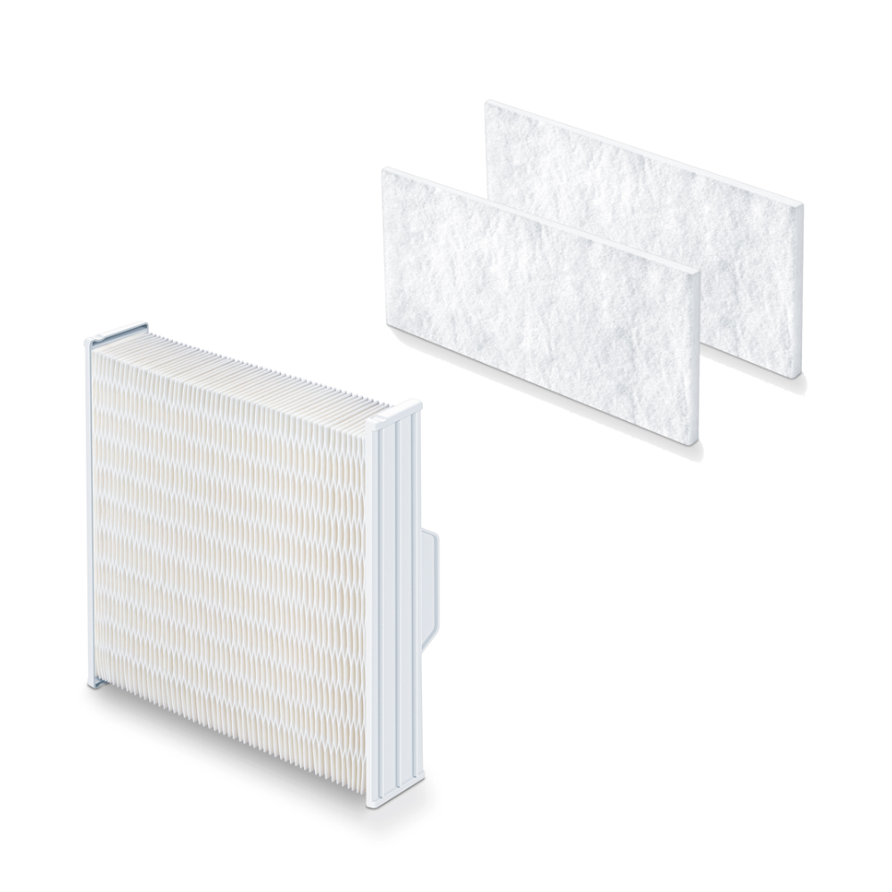 In the picture, there are three air filters. On the left, there is a rectangular, accordion-like pre-filter in white and light gray with a plastic frame. On the right, two identical rectangular Beurer GmbH MK 500 filter set water filters are arranged side by side without a visible frame.