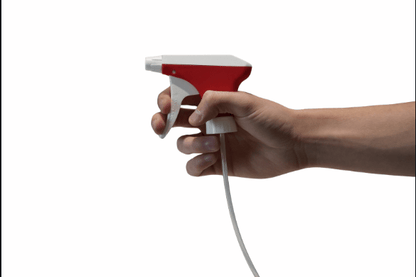 A hand holds an Altruan Sprayer K3 (white red, 25mm, with intake screen, dip tube 21.5cm) against a plain white background.
