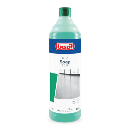 A green bottle with a blue-white label proudly presents the "Buzil Buz® Soap G 240 Wiping Care on a Soap Basis", a premium product by BUZIL-WERK Wagner GmbH & Co. KG. The soap-based formula ensures a clean, shiny floor. The bottle has a volume of 1 liter, making it ideal for all cleaning tasks.