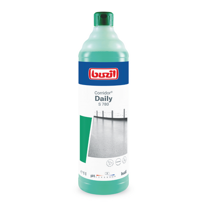 The image shows a bottle of Buzil Corridor® Daily S 780 floor care with odor blocker from BUZIL-WERK Wagner GmbH & Co. KG, which was specifically developed for sports floors and other water-resistant surfaces. The light blue bottle has a white label with a red logo and contains 1 liter of cleaning solution that also effectively blocks odors.