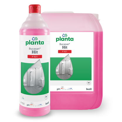 A pink bottle and a container of Buzil Planta Bucasan® Hit P 921 Ecological Sanitary Maintenance Cleaner from BUZIL-WERK Wagner GmbH & Co. KG, with labels showing images of a spotless, streak-free bathroom. This effective limescale remover solution has a pH value of 2 for superior cleanliness.