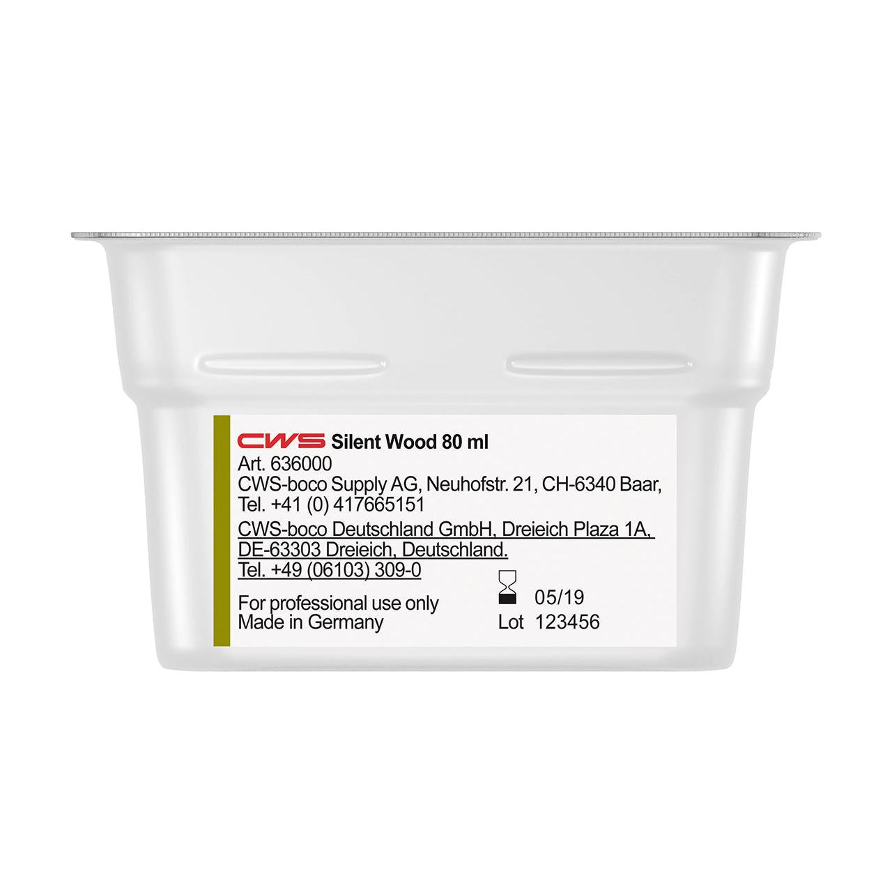 Close-up of a CWS ParadiseLine Washroom Fragrance for Fragrance Dispenser Paradise Air Bar container with manufacturer information, contact details, batch number, and expiration date on the label. For professional use only.