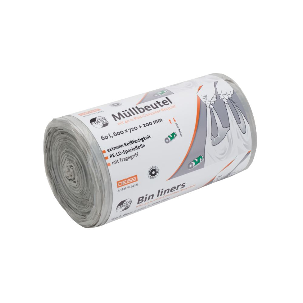 A roll of DEISS First Plus Pcr trash bags 60 liters, 34045 with carrying handle from EMIL DEISS KG (GmbH + Co.) highlights the dimensions and climate-neutral nature in German script. The label with a trash can symbol contains text in English and German. These partially unrolled trash bags contain a PCR content of 40% and are intended for environmentally conscious users.