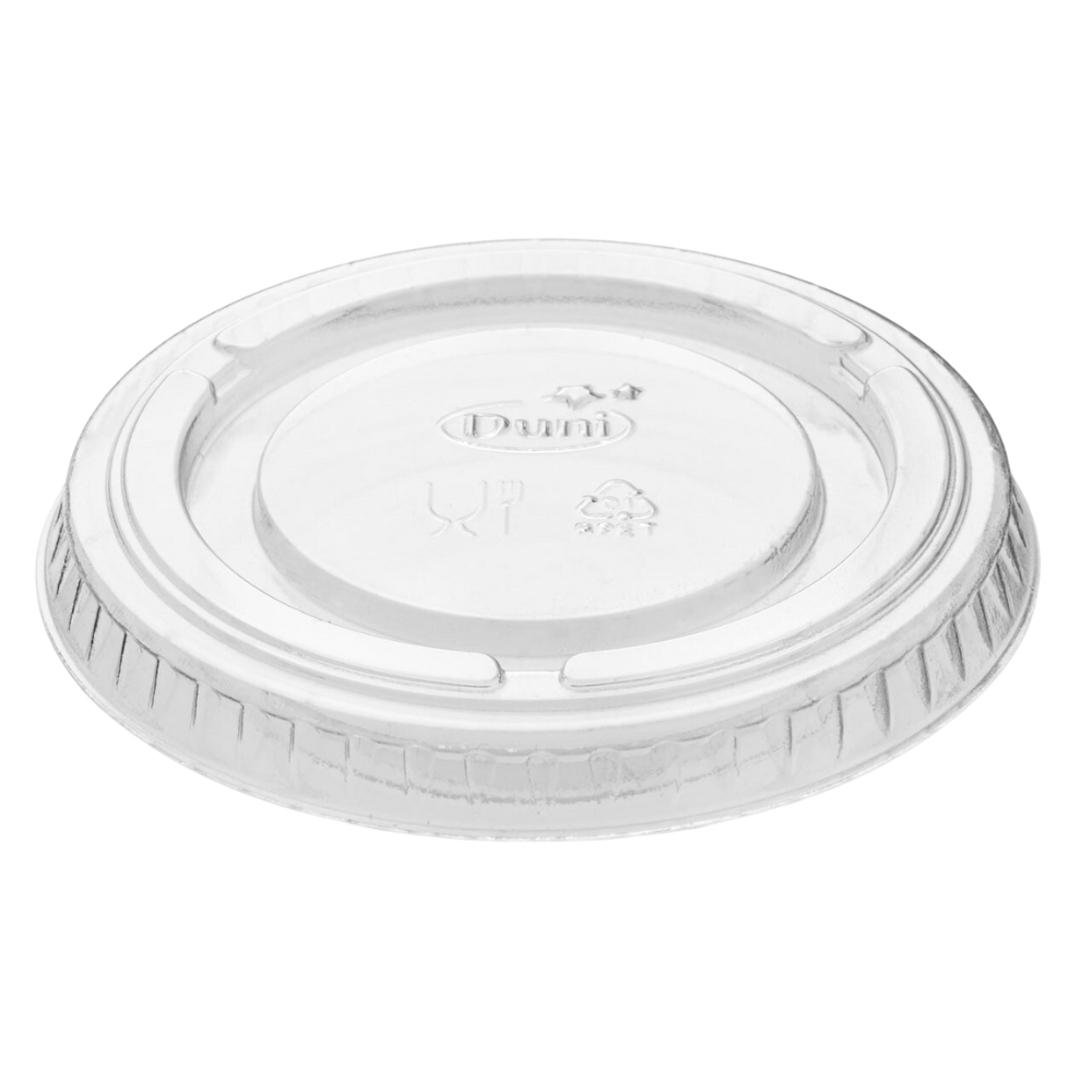 A clear, transparent lid from Duni GmbH features ribbed edges and embossed symbols for recycling and disposal on its surface. It is specifically designed for a 60 ml container, which is often used in the catering industry for storing or taking away food.