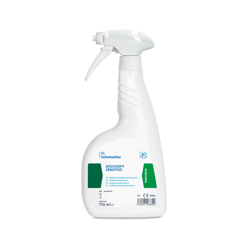 A 750 ml spray bottle of Dr. Schumacher Descosept Sensitive Rapid Disinfection from Dr. Schumacher GmbH with a white spray nozzle. The green-accented label contains product details and application instructions for the disinfection of medical products.