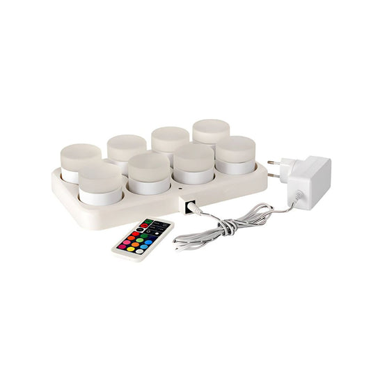 Das Duni LED-Kerzen-Set der Duni GmbH beinhaltet acht Multicolor-LED-Kerzen mit rechteckiger Ladestation, inkl. Warmweiß-Modus, Fernbedienung und Netzteil mit Kabel.
