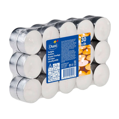 A 30-pack of Duni tealights, Ø39 mm, white from Duni GmbH offers 6 hours of burn time. Each tealight is housed in a metal casing; the package is wrapped in clear plastic and features a blue label with details and burning tealights.