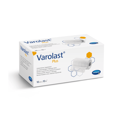 The image shows a rectangular white box with Hartmann Varolast® Plus zinc paste bandage. The packaging displays an image of a rolled bandage and hexagonal motifs. Ideal for the treatment of edema and phlebitis, the dimensions stated on the box are 10 cm x 10 m. The Paul Hartmann AG logo is visible at the bottom right.