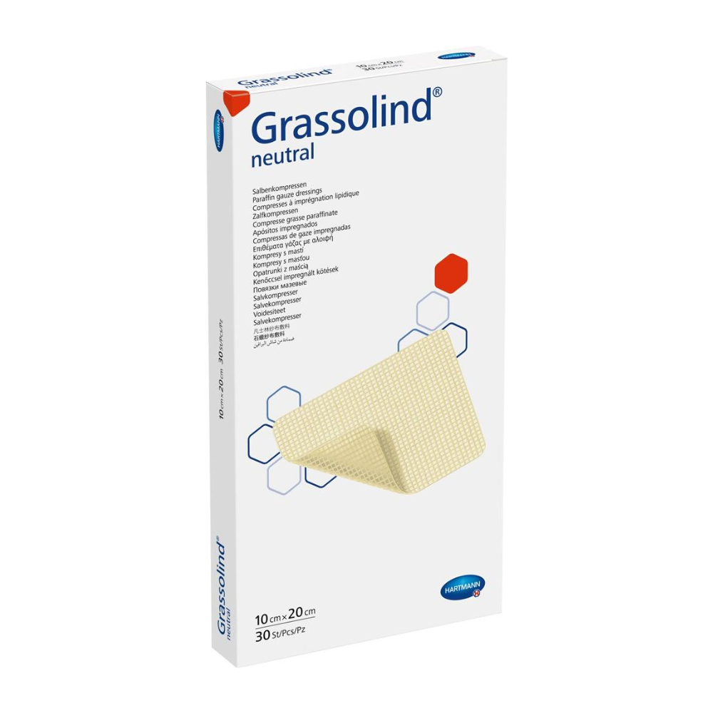 A box of Hartmann Grassolind® ointment compress, various sizes, a medical wound dressing, with important product information and an image of the ointment compress on the front. The packaging is predominantly white.