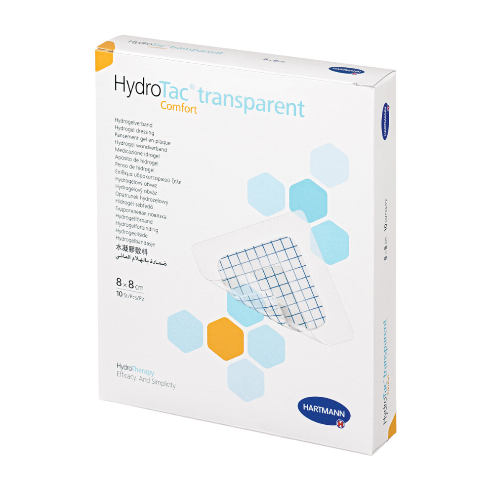 A box of Hartmann HydroTac® transparent comfort wound dressing by Paul Hartmann AG. The packaging is white with blue and turquoise design elements and includes an image of the product as well as multilingual descriptions.