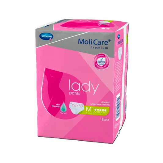 Eine Packung Hartmann MoliCare® Premium lady pants Inkontinenzhosen der Paul Hartmann AG in mittlerer Größe mit 8 Stück. Die Verpackung ist rosa und weiß, mit dem Hinweis „diskretes Gefühl und hautfreundlich“ versehen, was den Tragekomfort des Produkts unterstreicht.