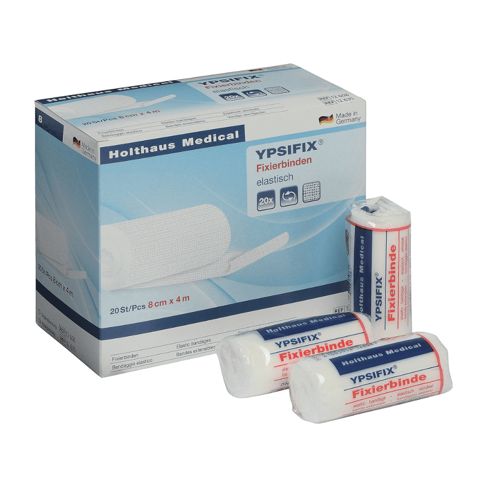 Image of a box of Holthaus Ypsifix® fixation bandage from Holthaus Medical GmbH & Co. KG, 8 cm x 4 m. The box contains 20 individual bandages. Three individual bandages are shown on the front of the box; two are shrink-wrapped in plastic, while one is partially unpacked. Made in Germany, perfect for securing wound dressings.