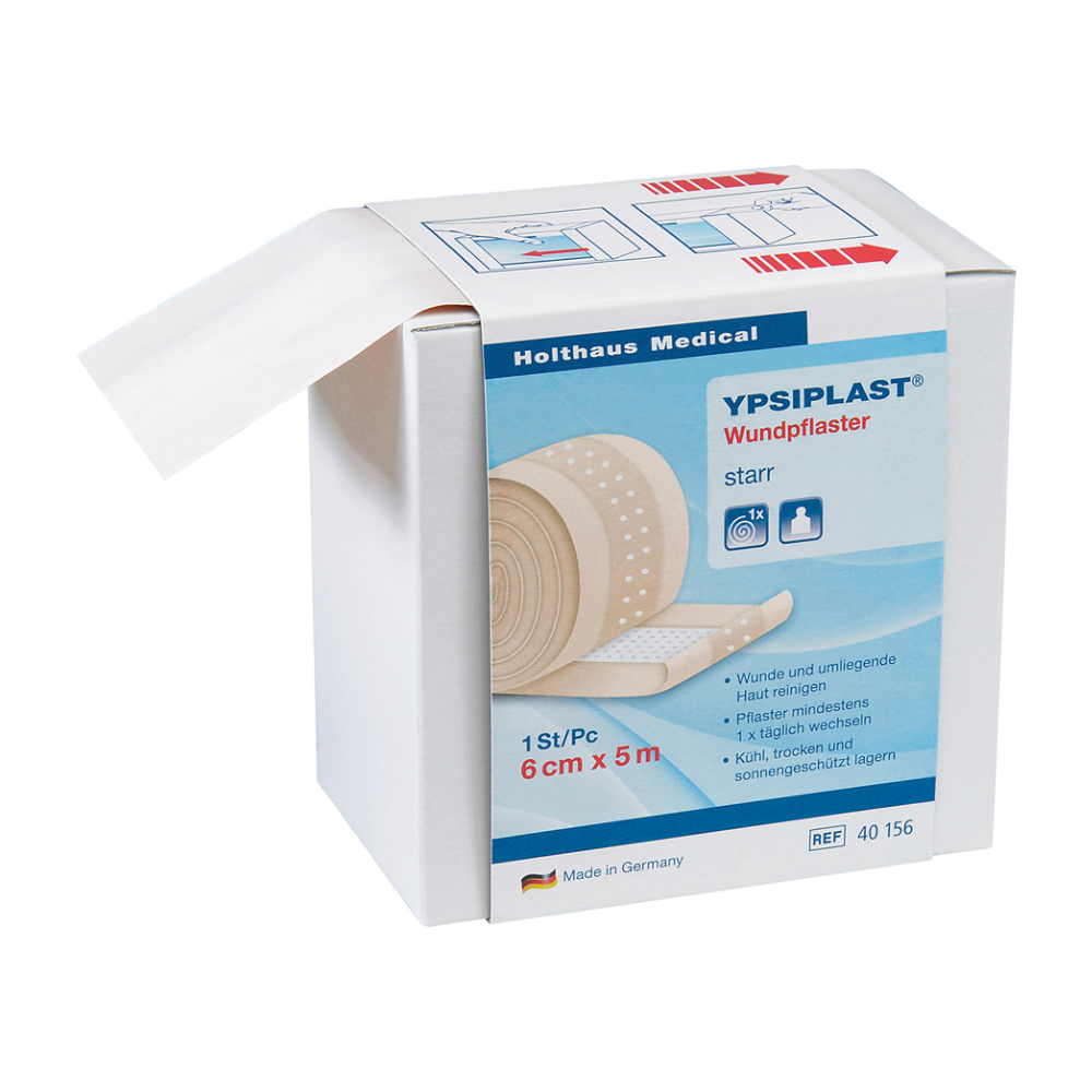 A box of Holthaus Ypsiplast wound plaster from Holthaus Medical GmbH & Co. KG. The packaging with the dimensions "6 cm x 5 m" offers multilingual application and storage instructions. The image shows an open box with partially pulled out wound plaster, ideal for protecting small injuries.