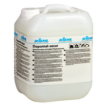 Weißer Kunststoffbehälter mit Griff und der Aufschrift "Kiehl Dopomat-secur Automatenreiniger mit Antigleit-Pflegekomponente" der Johannes Kiehl KG. Das deutsche Etikett enthält Gebrauchsanweisungen und Sicherheitshinweise.