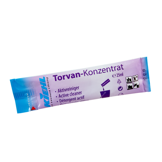 Ein Einwegbeutel Kiehl Torvan-Konzentrat Aktivreiniger, 25 ml, der Johannes Kiehl KG ist auf einer lila-blauen Verpackung mit deutschen, englischen und französischen Symbolen/Texten versehen, die auf die Funktion als Aktivreiniger hinweisen.