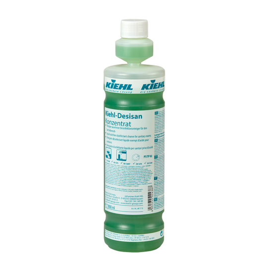 Eine grüne Kunststoffflasche Kiehl Desisan Konzentrat Flüssiger säurefreier Desinfektionsreiniger der Johannes Kiehl KG, mit weißer Kappe und deutschem Etikett mit Produktinformationen, Piktogrammen und Anwendungshinweisen für säurefreie hygienische Reinigung.