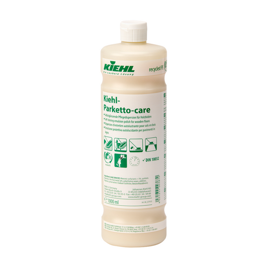 Eine 1.000-ml-Kunststoffflasche Kiehl Parketto-care Selbstglänzende Pflegedispersion für Holzböden der Johannes Kiehl KG ist mit einem grün-weißen Etikett, Piktogrammen für Parkettböden, einer Anleitung und einem Schraubverschluss versehen.